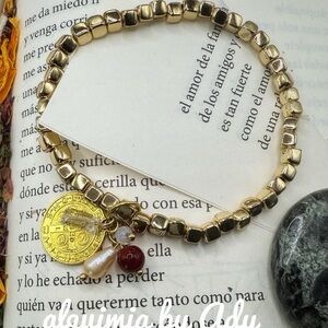 Gold Charm Bracelet with Intricate Beading